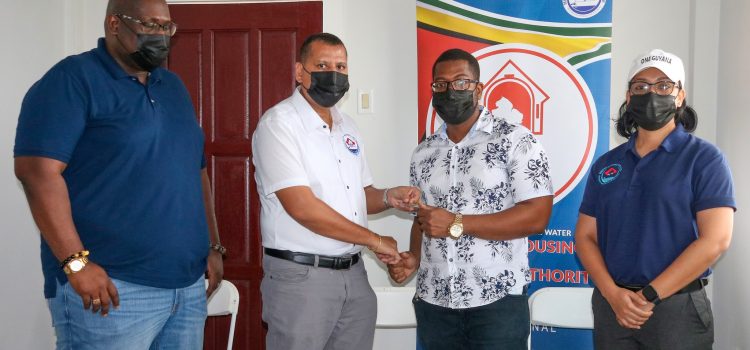 Eleven Families Receive Moderate-Income Homes at Cummings Lodge Housing Scheme